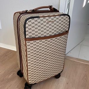 Michael Kors carry on suitcase in brown print - lightly used